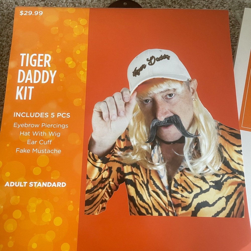 Tiger king Halloween costume with accessories.